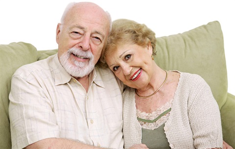 elderly couple smiling