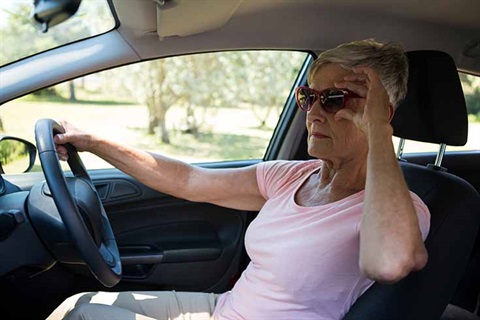 Senior Woman Driving A Car.jpg