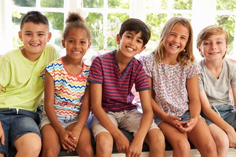 Group of children on window seat