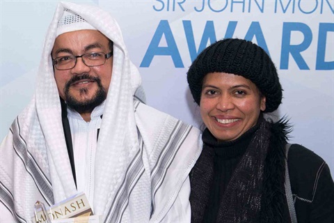 Mohamed Mohideen photographed with award