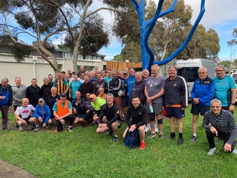 Tally Ho fitness group in front of Blue Tree